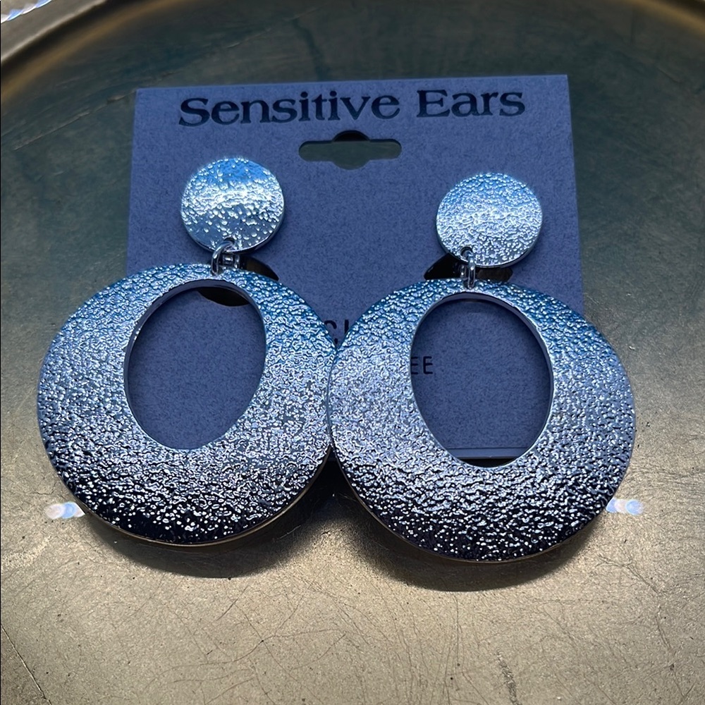 R61 Silver Textured Clip Earrings